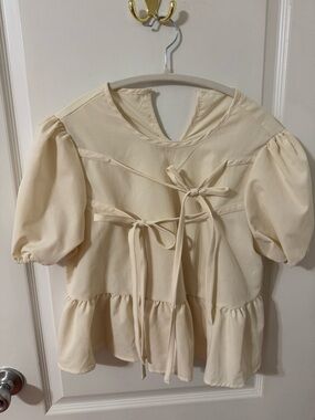 Cream Puff Sleeve Tie-Front Peplum Top
